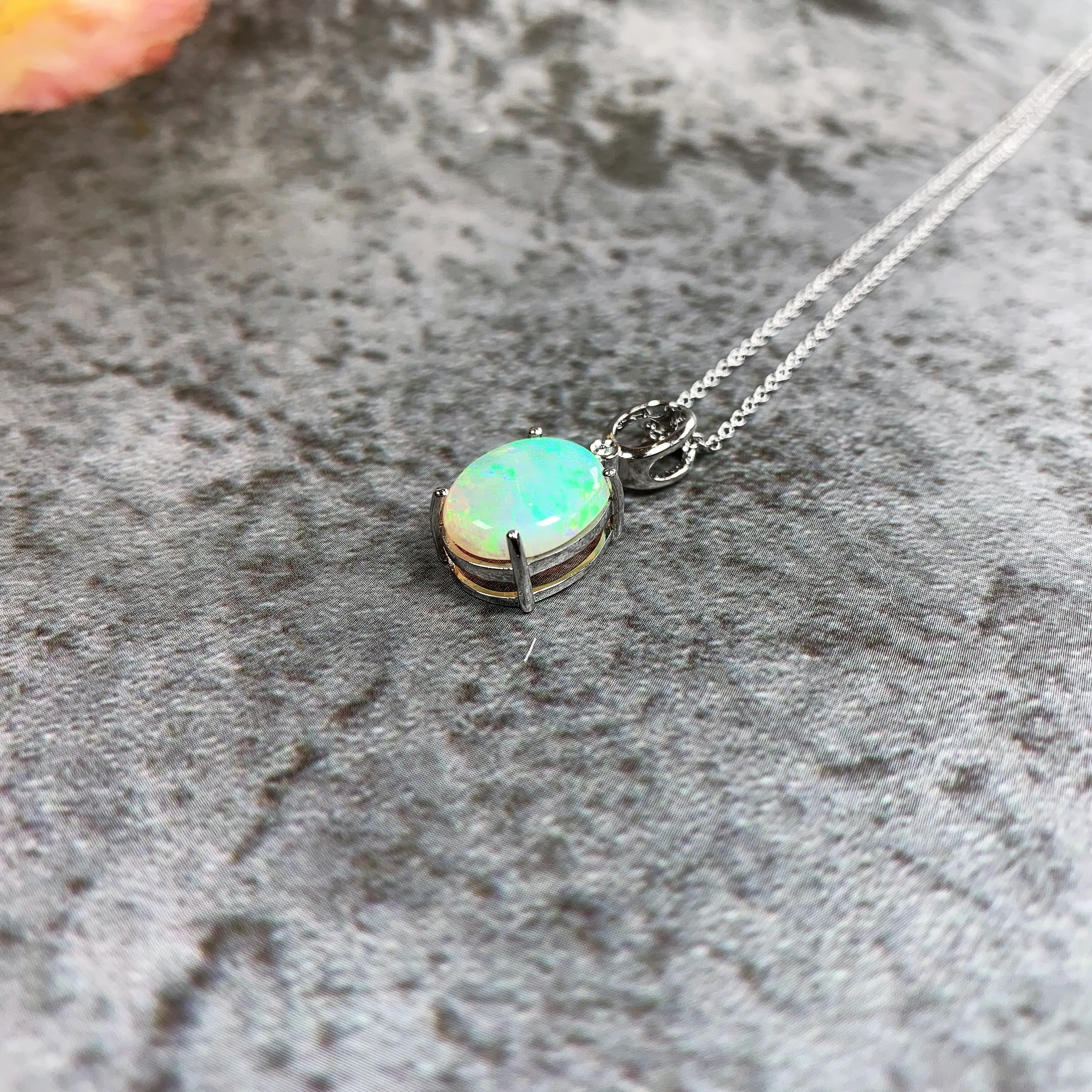 14kt White Gold 2.72ct Crystal Opal and 0.02ct Diamond pendant