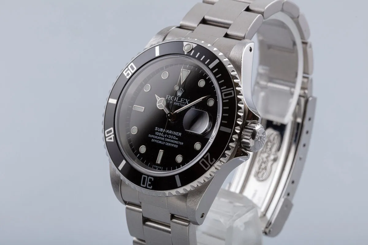 1999 Rolex Submariner 16610 with Box & Papers "Swiss Only" Dial Box & Papers