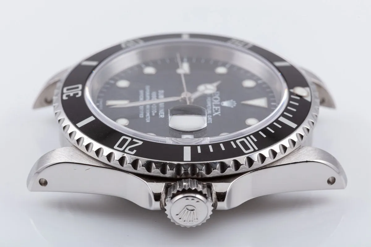 1999 Rolex Submariner 16610 with Box & Papers "Swiss Only" Dial Box & Papers