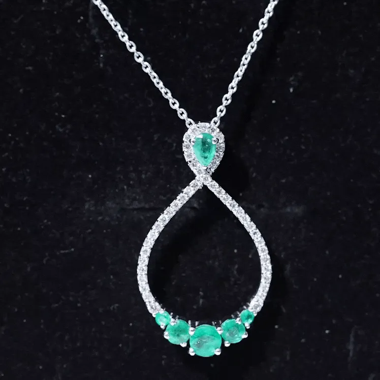 Emerald and Diamond Teardrop Necklace with Graduated Style