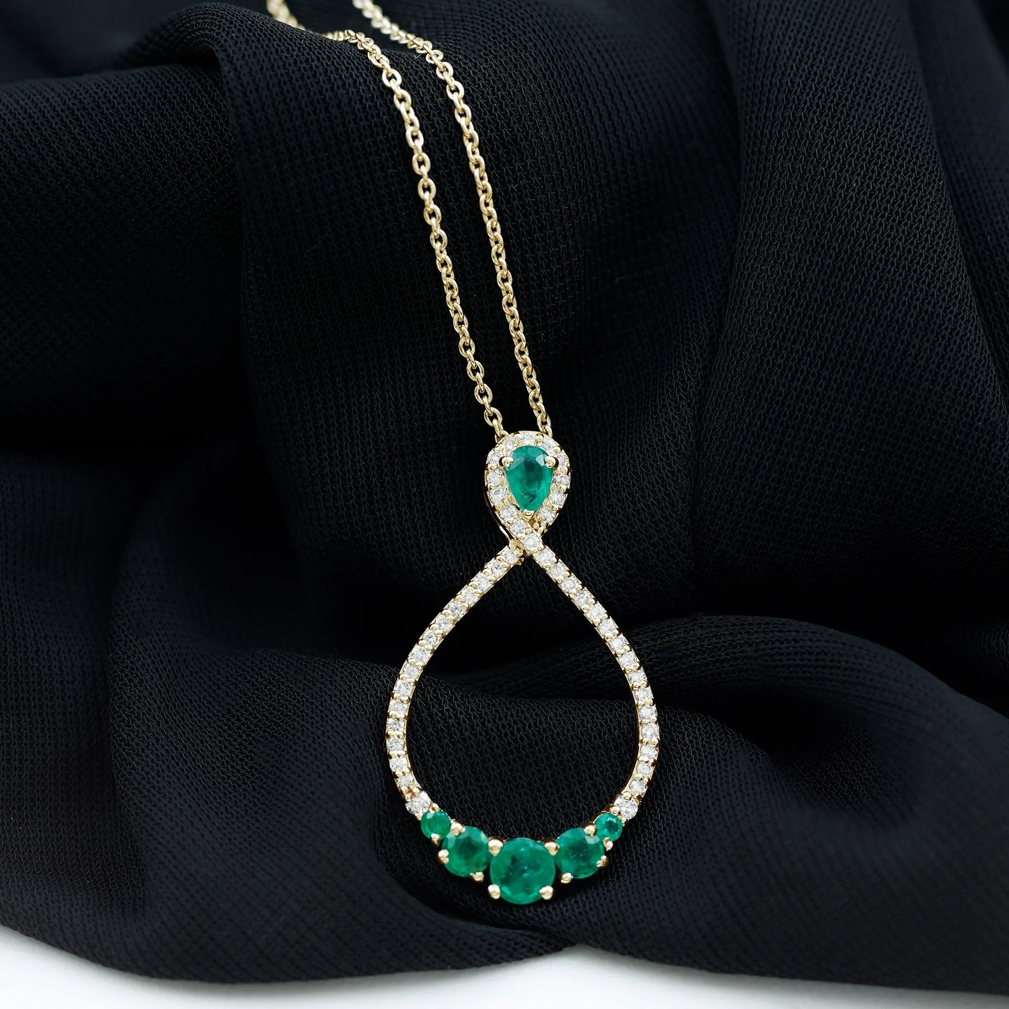 Emerald and Diamond Teardrop Necklace with Graduated Style