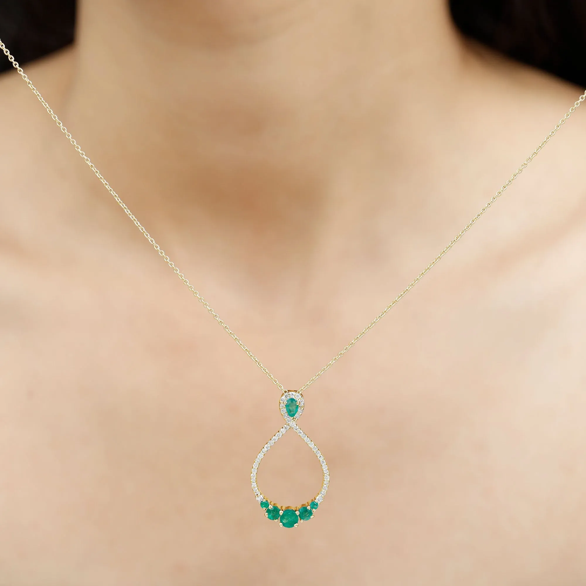 Emerald and Diamond Teardrop Necklace with Graduated Style