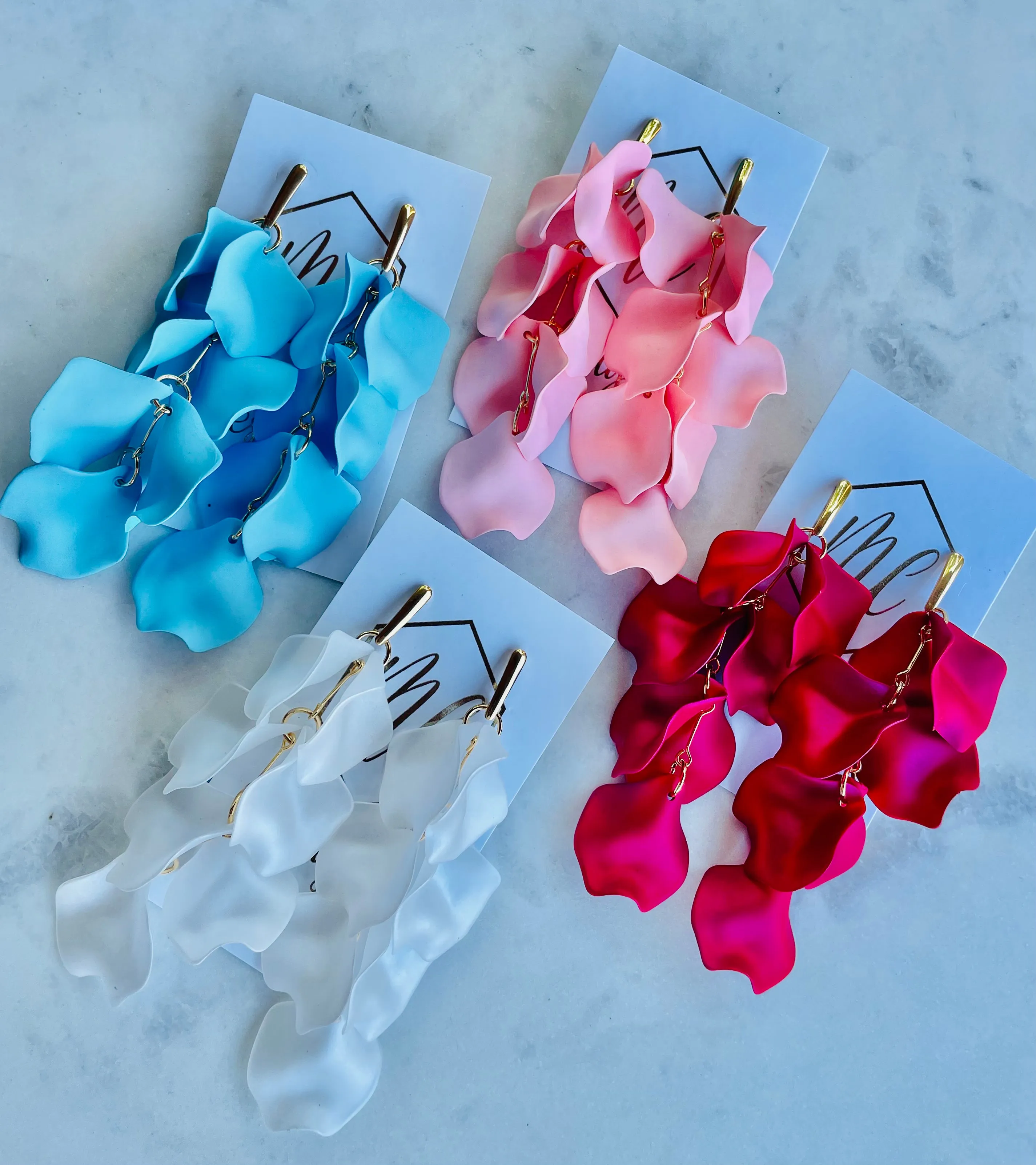 Reverse Petal Dangle earrings with elongated gold posts
